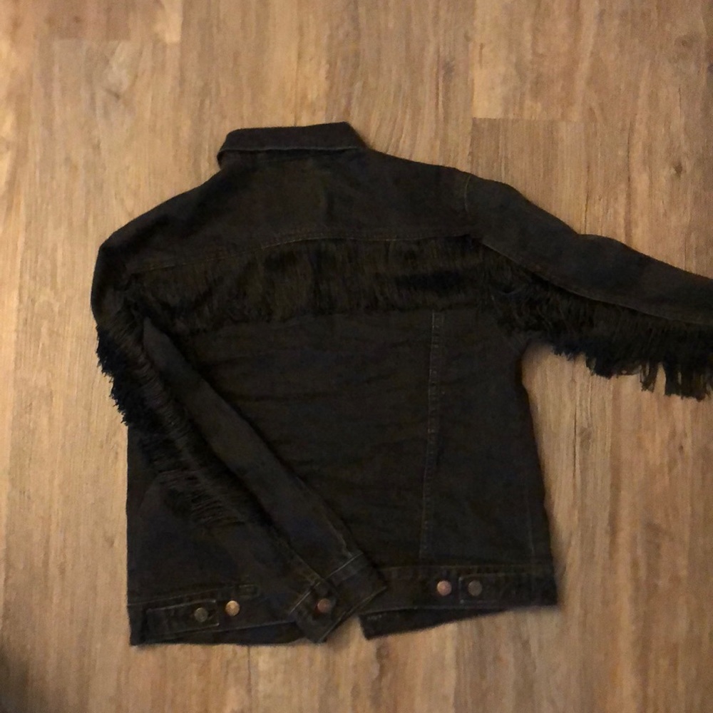 Levi’s black denim jacket with fringe